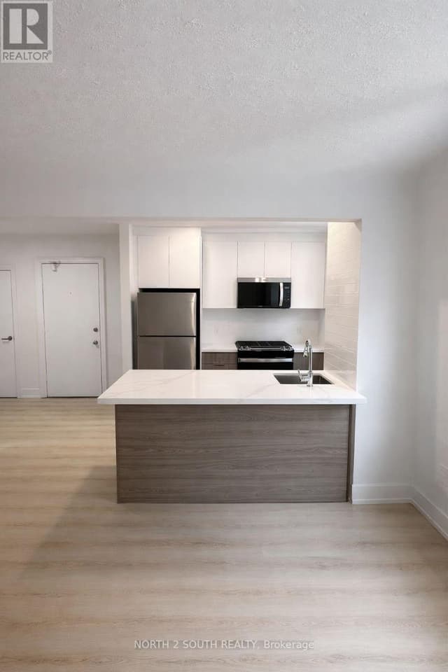 3 - 1024 King St. E