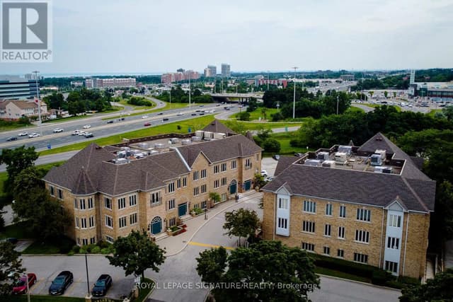 300 - 416 North Service Rd. E